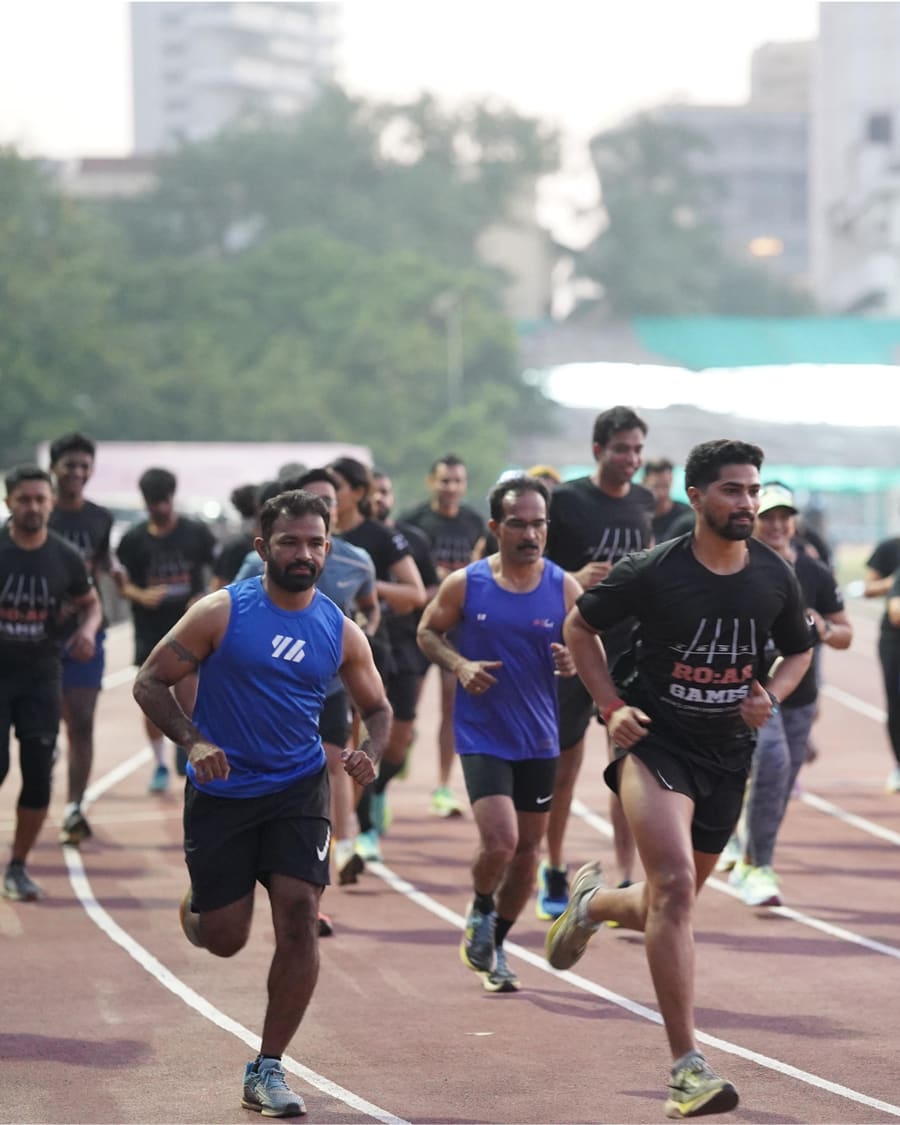 A pack of R.O.A.R Games runners on the open-air track