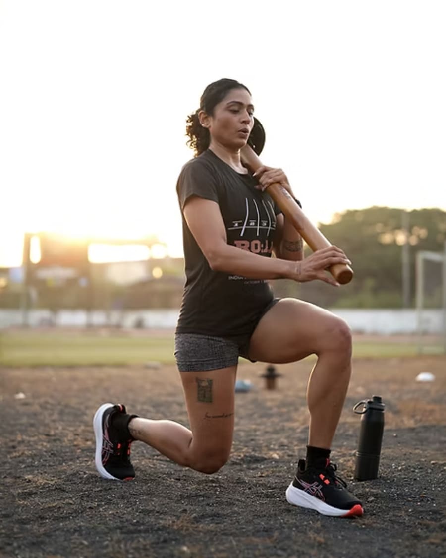 An athlete mid-lunge holding the R.O.A.R mace