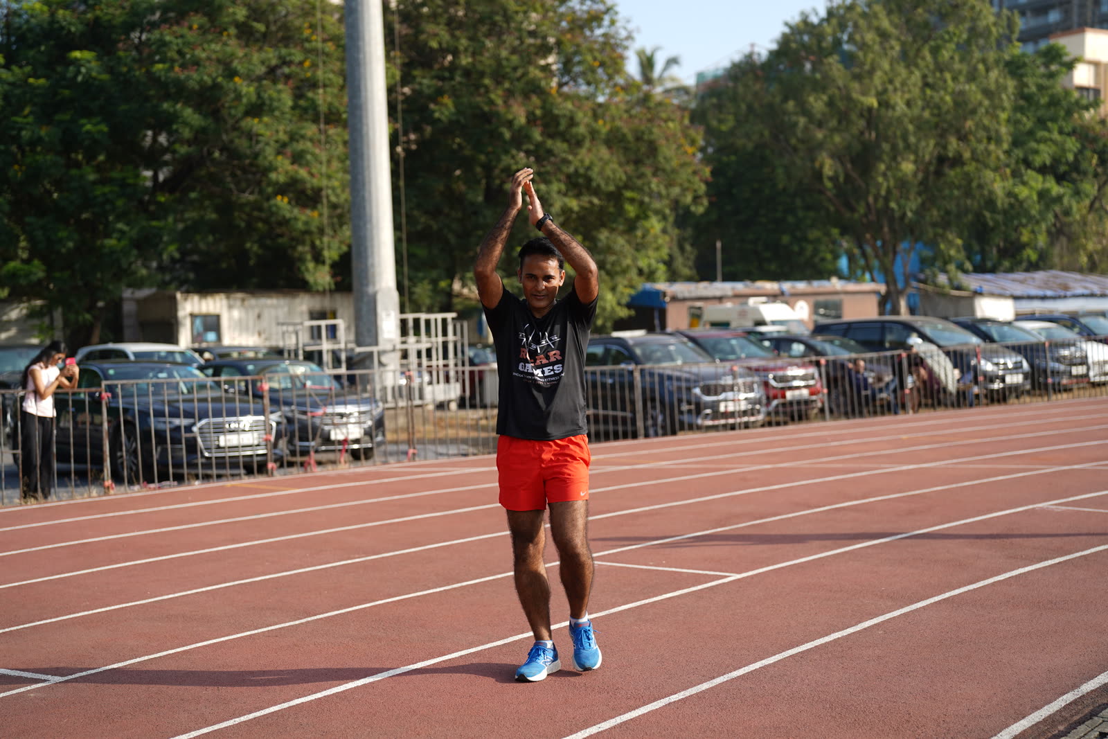 A finisher clapping on the R.O.A.R Games track