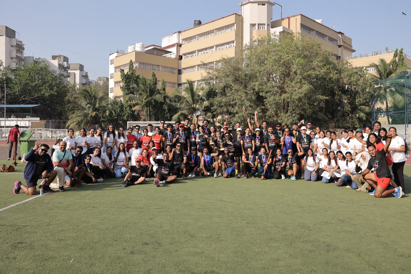 The full R.O.A.R Games community group photo on the field